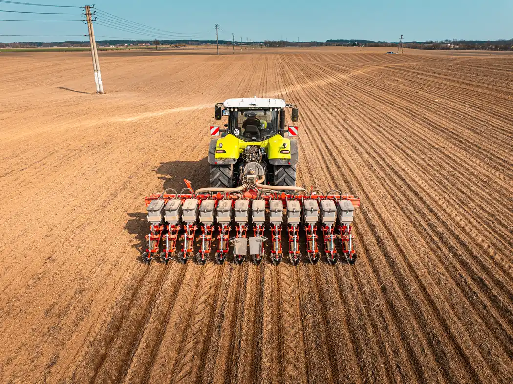 Czajkowski PSP precision seeder viewed from behind while sowing in the field.